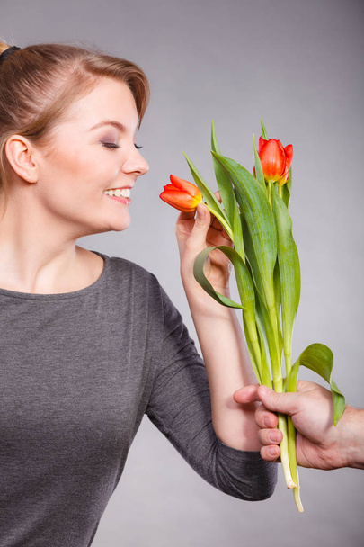 Charming woman smelling flower feel peace. - Φωτογραφία, εικόνα