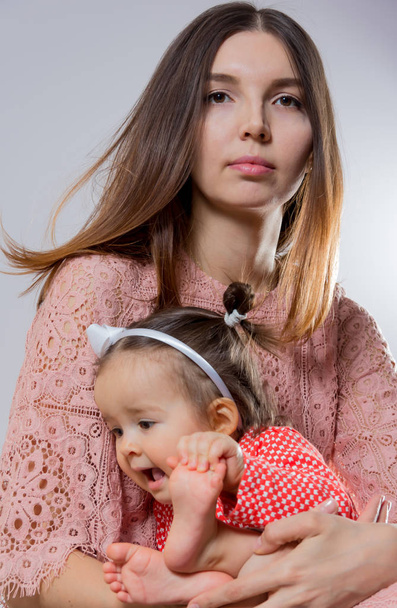 Young mother with her daughter - 写真・画像