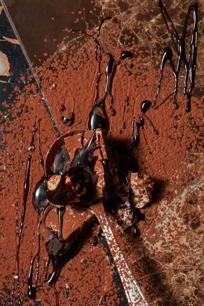 spoon with chocolate and cocoa powder - Фото, зображення