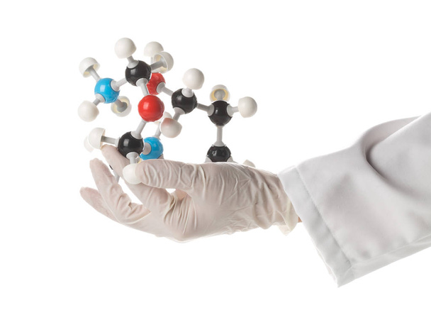 Researcher with glove holding chemical ball and stick molecule m - Foto, Imagem