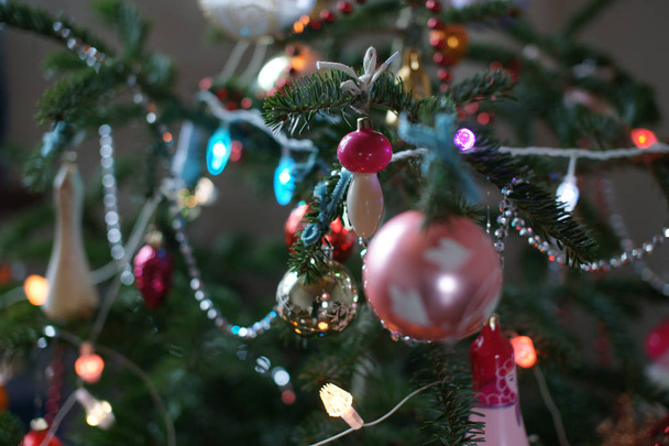 Old Soviet Christmas decorations on New Year tree. - Foto, imagen