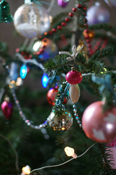 Old Soviet Christmas decorations on New Year tree. - Foto, afbeelding