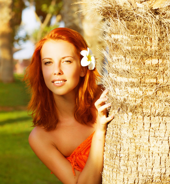 Pretty woman in tropical nature - Foto, Imagen