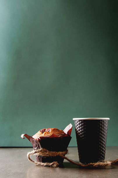 Blueberry muffins and fresh fruit, a cup of black coffee. Tasty  - 写真・画像