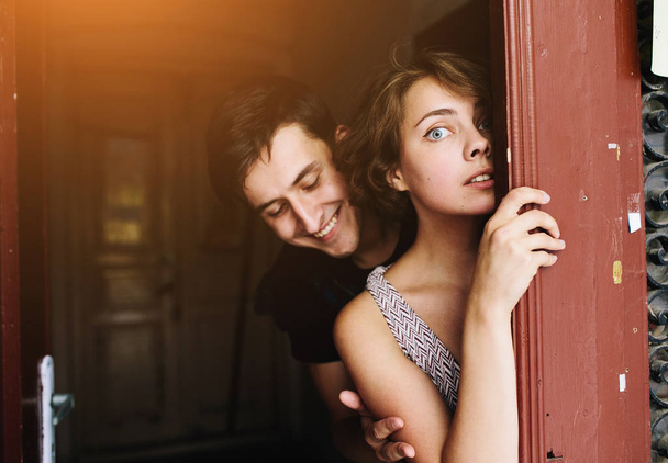 couple posing in the doorway - Photo, Image