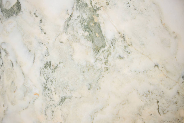 Lightened slices marble onyx. Horizontal image. Warm green colors. Beautiful close up background - Photo, image