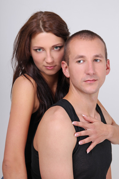 Mann und Frau in schwarzen Hemden - Foto, Bild