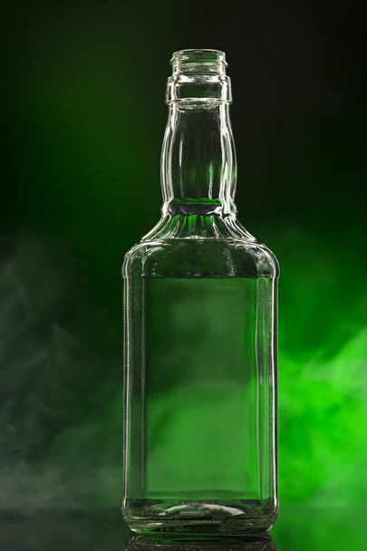 Empty colorless glass bottle - Photo, image