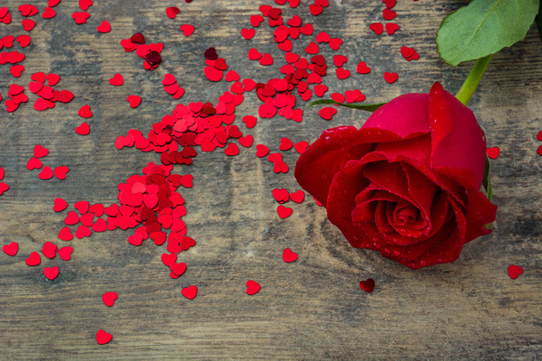 Red rose on wooden background.Love concept valentines day. Copyspace. - Fotó, kép