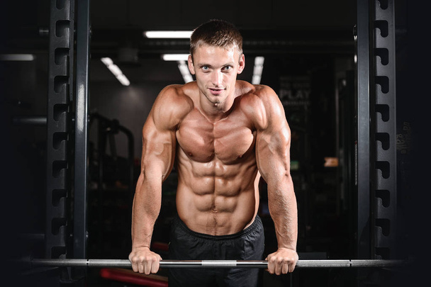 young man train in gym healthcare lifestyle sexy caucasian ma - Foto, Imagen