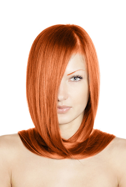 Fashion conceptual portrait of a woman with beautiful long red healthy shiny hair - Foto, imagen