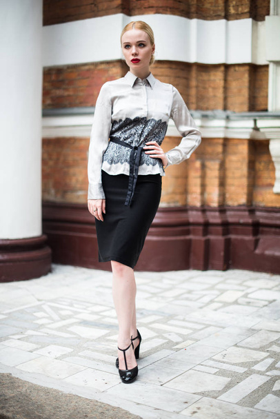 Pretty young business woman wearing formal clothes - Photo, Image
