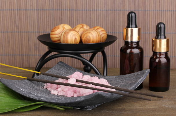 aromatherapy setting on brown bamboo background - Fotografie, Obrázek