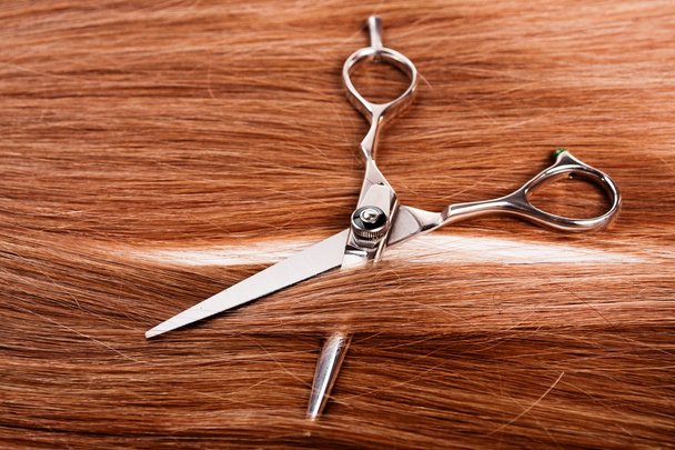 Straight healthy woman hair and scissors - Foto, Imagen