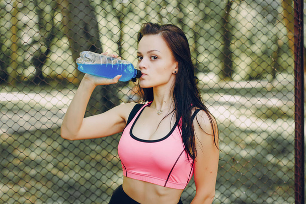 sports girl in park - Valokuva, kuva