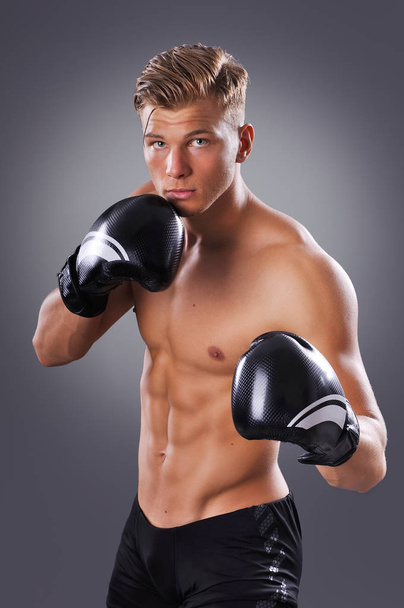 Portrait of Handsome Muscular Fighter Practicing. Concept of Healthy Lifestyle - Fotó, kép