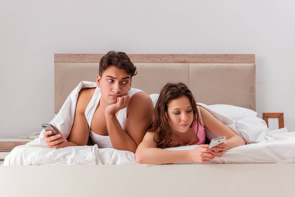 Family conflict with wife husband in bed - Photo, image