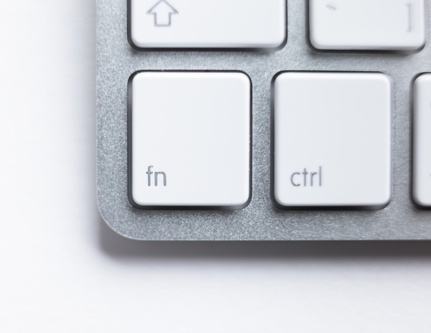 Part angle of light keyboard. Focus on keys - Фото, изображение