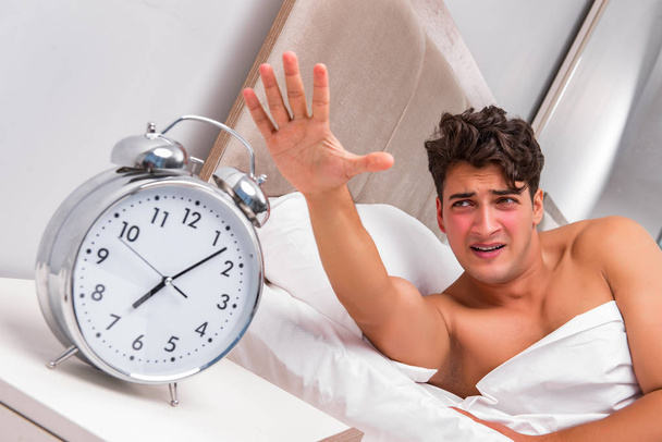Man having trouble waking up in the morning - Photo, Image