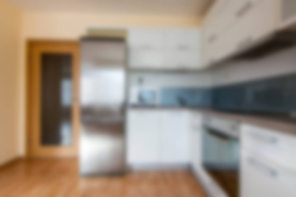 Abstraktní moderní bílý kuchyňský interiér pro pozadí rozostření - Fotografie, Obrázek