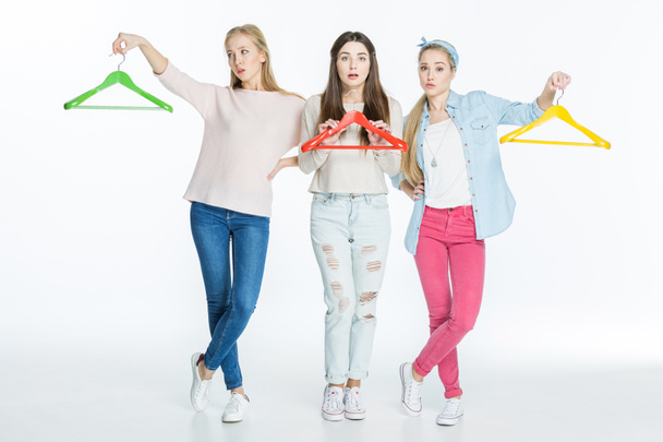Women with colorful hangers - Фото, изображение