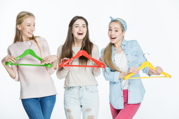 Women with colorful hangers - Foto, Imagen