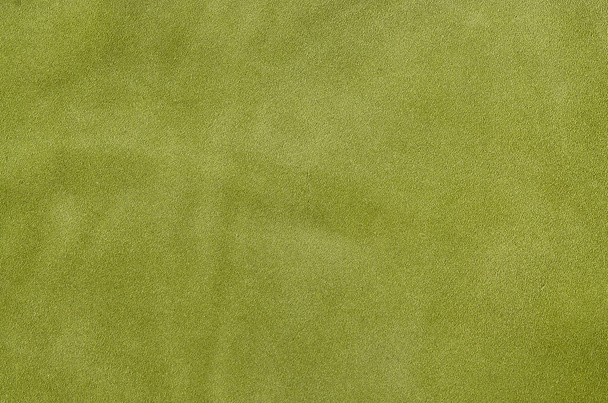 Μαλακό δέρμα σουέτ σε γήινο πράσινο ως υφή φόντου. Εσωτερικη δέρμα - Φωτογραφία, εικόνα