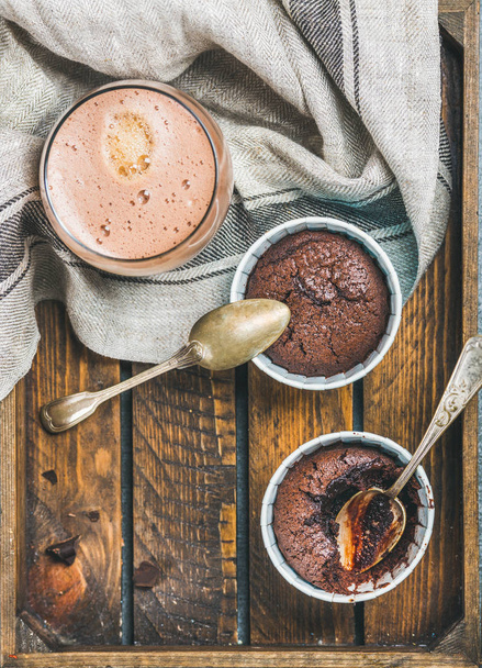 Chocolate souffle in baking cups - Фото, изображение
