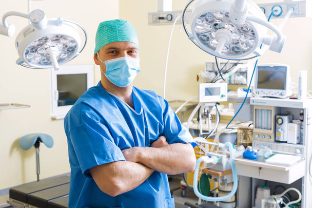 Male doctor in operation room - Фото, зображення