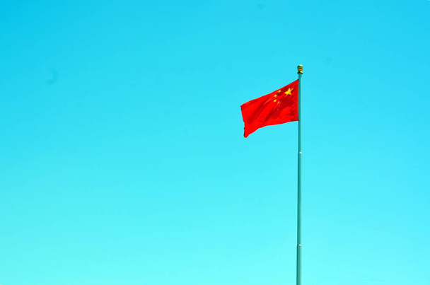Chinese national flag waving on a clear day - Photo, Image