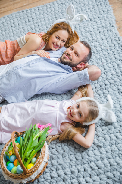 Family lying on the floor  - Photo, Image
