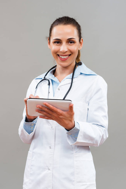 Female doctor using digital tablet - Foto, Imagem