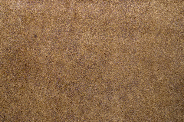 Brązowe zamszowe miękkiej skóry jako tekstura tło. Skóra z bliska - Zdjęcie, obraz