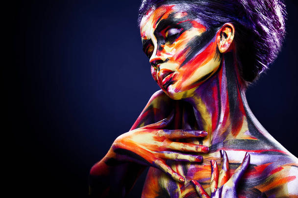 Portrait of the bright beautiful girl with art colorful make-up and bodyart - Foto, imagen