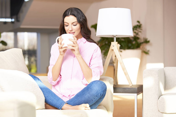woman having morning coffee at home - Foto, Imagen