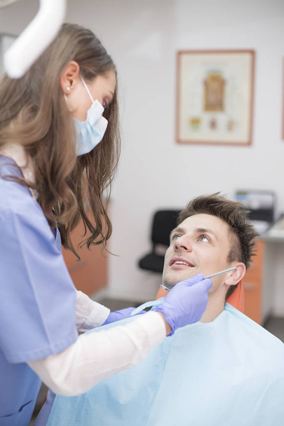 Patient having dental checkup - Fotoğraf, Görsel