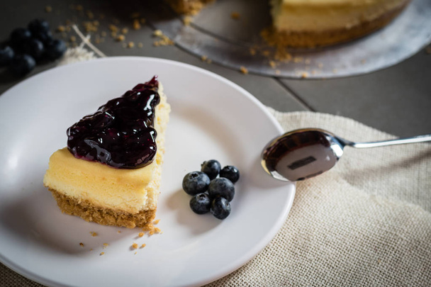 piece of freshness delicious blueberry cheese cake on plate - 写真・画像