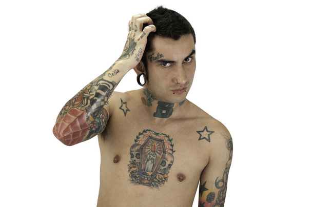 Thoughtful tatto guy with reamer ear on white backgroundthought - Foto, Imagen