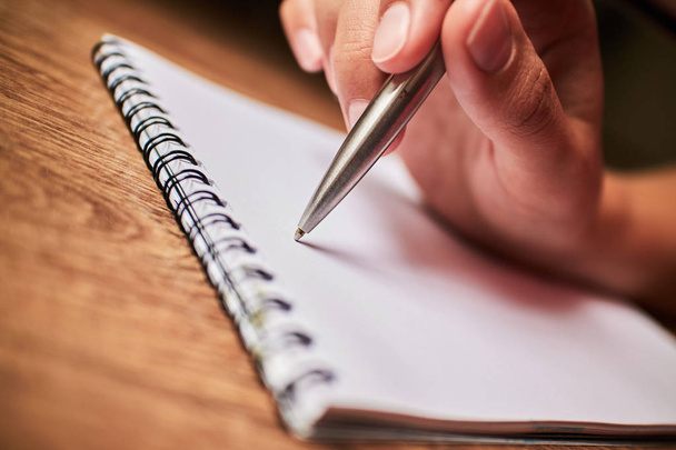 write with a pen in a notebook  - Foto, Bild