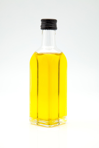 Olive oil in a bottle - Фото, зображення