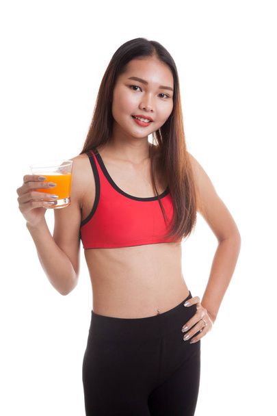 Beautiful Asian healthy girl drinking  orange juice. - Fotó, kép
