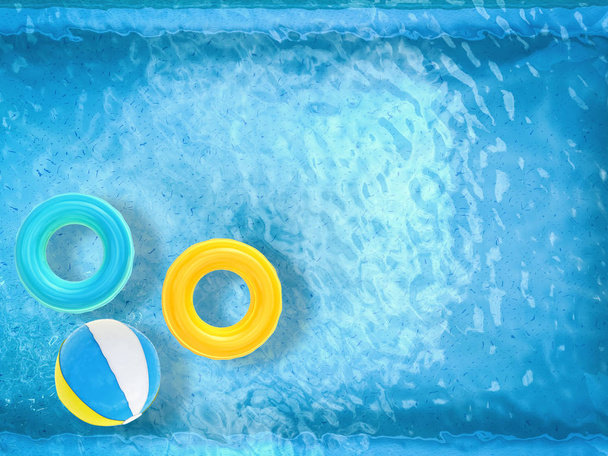 beach balls and swim rings floating on pool  - Photo, Image