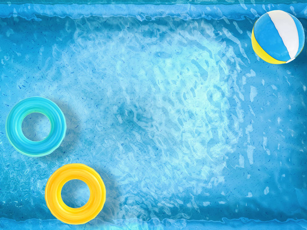 bolas de playa y anillos de natación flotando en la piscina
  - Foto, Imagen