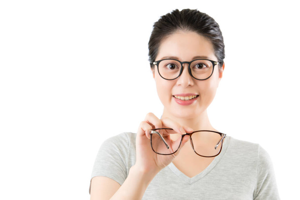 young smilling asian woman show new vision glasses - Fotó, kép