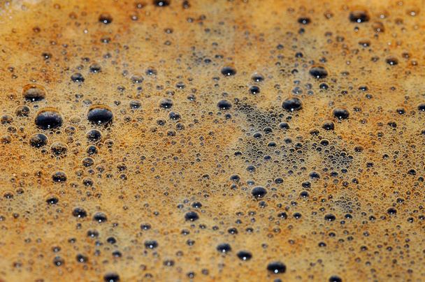 Coffee crema texture. Black coffee foam. - Фото, изображение