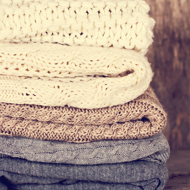 A stack of woolen sweater, plaid - Fotoğraf, Görsel