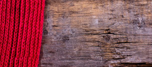 Strickkariert, Pullover auf alten Holzbrettern - Foto, Bild