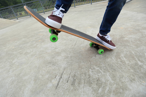 skateboarder legs practicing outdoors - Foto, Imagem