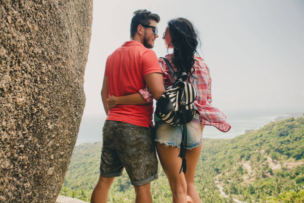 young couple in love standing on mountain, landscape background, - Φωτογραφία, εικόνα
