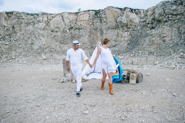 Woman and man in stone quarry - 写真・画像